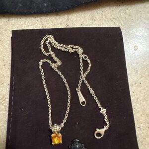 Elegant Silver Necklace with Amber Pendant